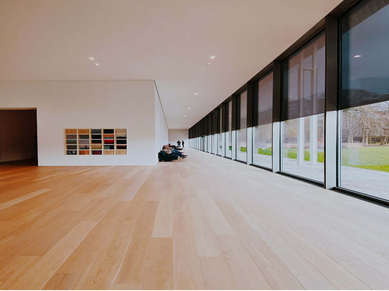 Large hallway with beautiful laminate flooring